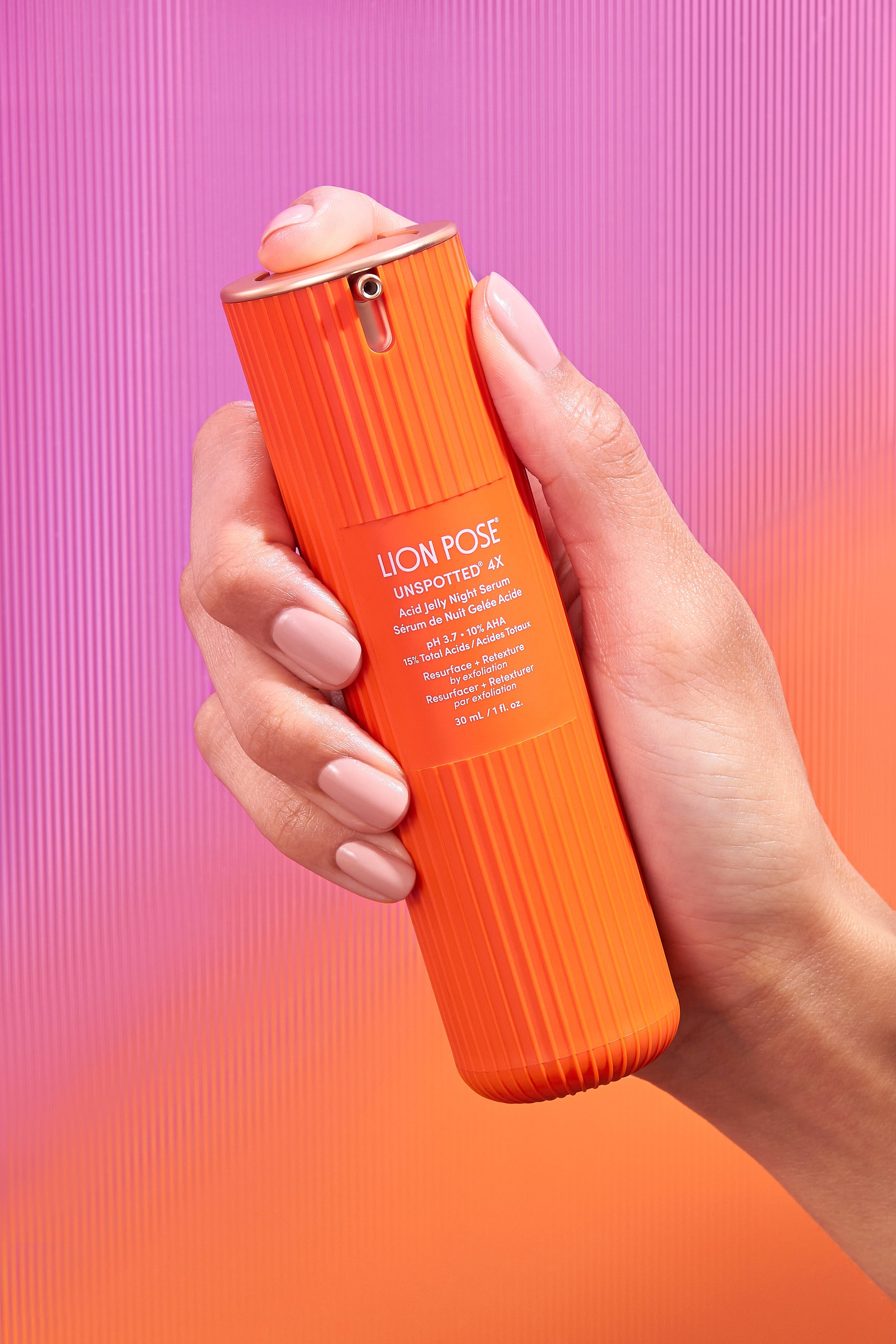 Lion Pose UNSPOTTED 4X Acid Jelly Night Serum in a minimalist skincare setting, highlighting a dermatologist-developed serum formulated to visibly fade sun spots and dark spots.